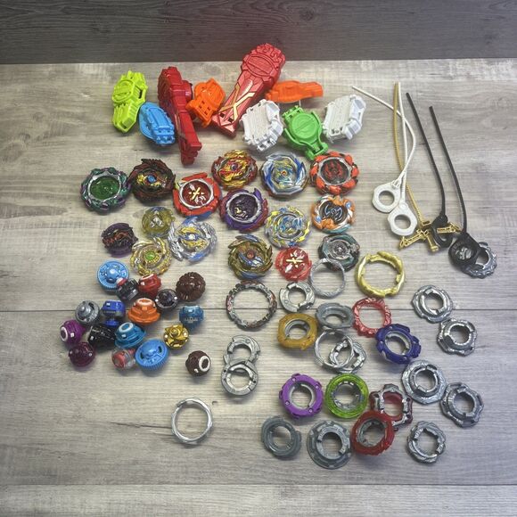 Assorted Large Lot of Beyblade Bay Blades Launchers Parts Metal & Plastic - Picture 1 of 14